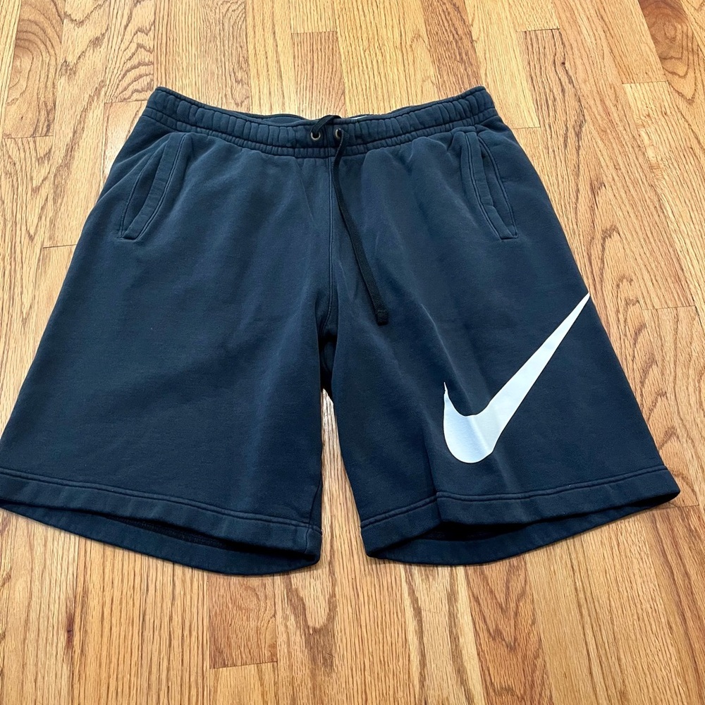 Nike Men's Black Athletic Shorts with White Swoosh